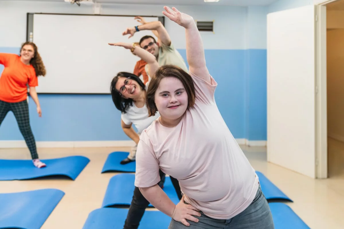 Heartwarming yoga pose with down syndrome student 2025 03 08 19 38 59 utc min