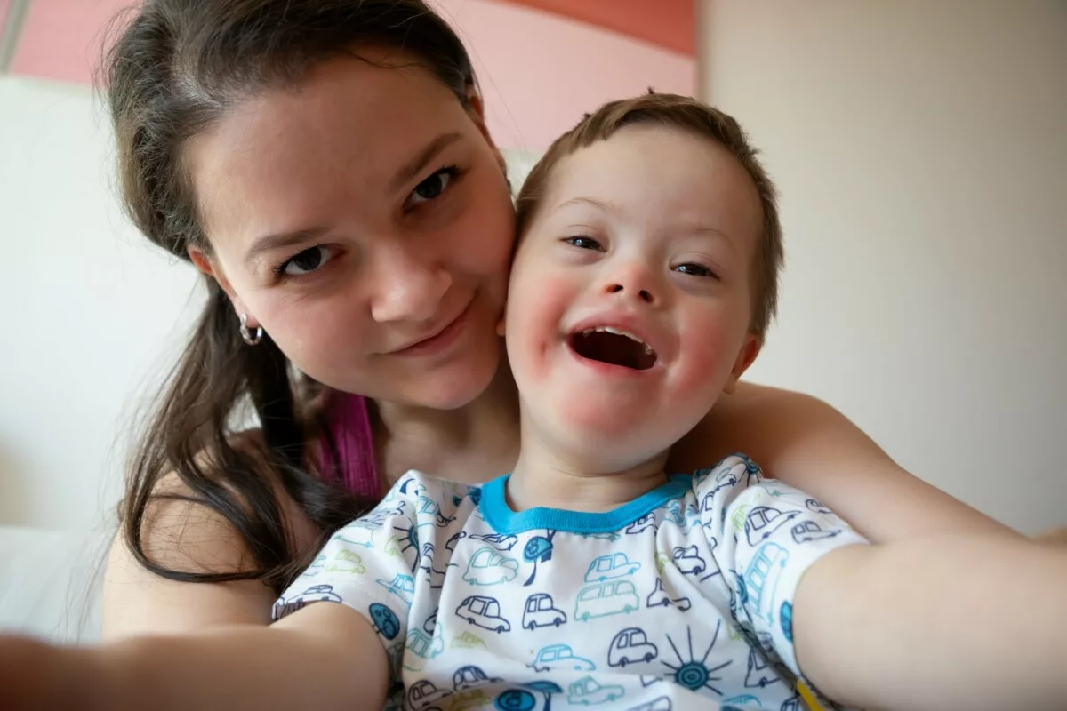 Selfie of cute small boy with down syndrome with h 2025 03 10 16 27 43 utc min